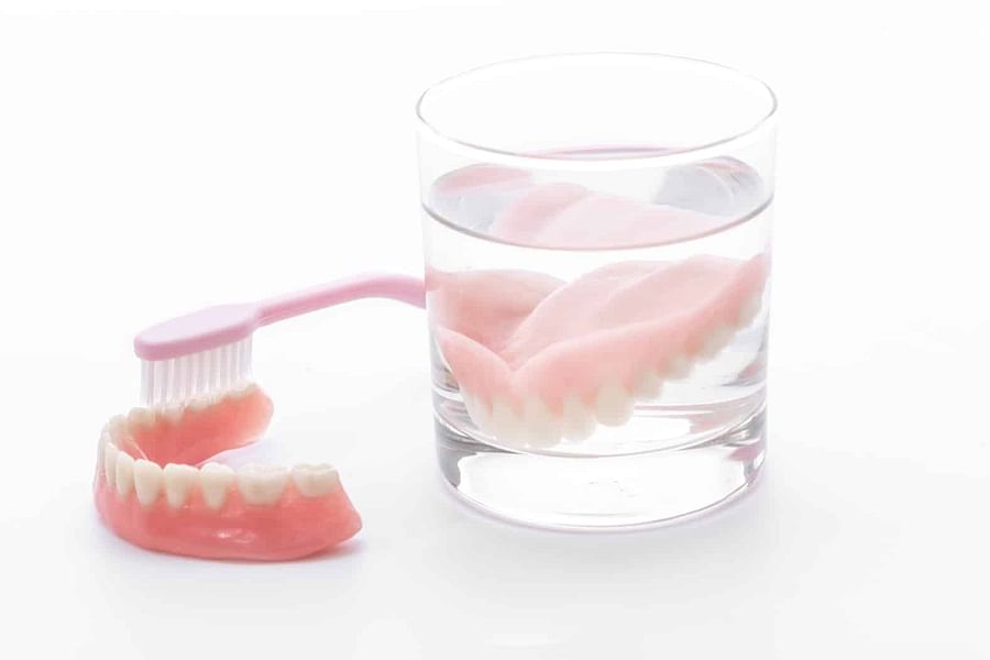 rinsing dentures after soaking