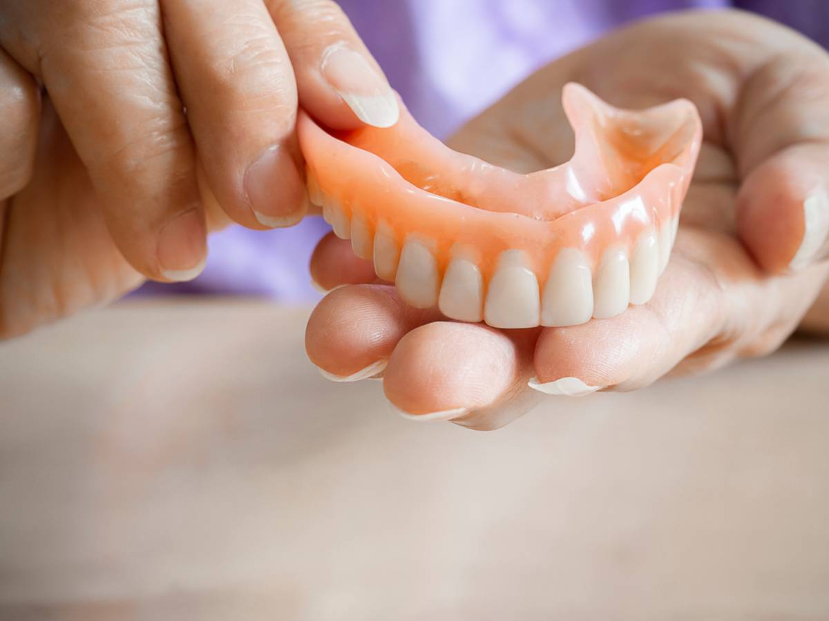dentist checkup for denture fit