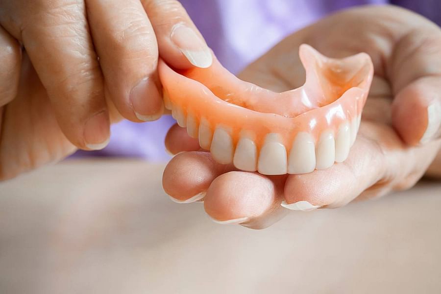 dentist checkup for denture fit